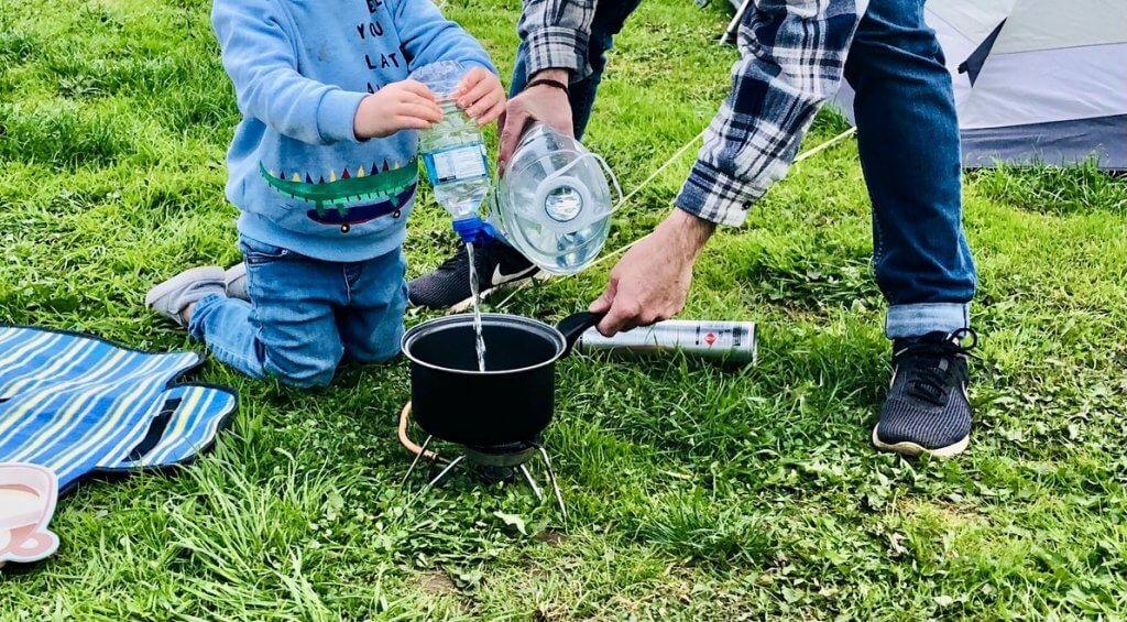 Toddler Cooking While Camping