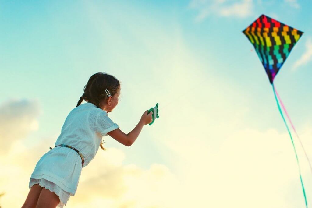 Girl Flying a Kite
