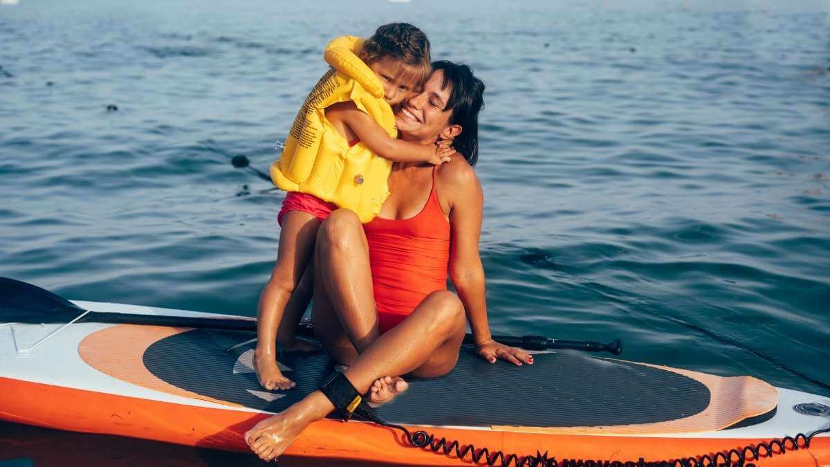 Paddle Boarding Mum and Daughter