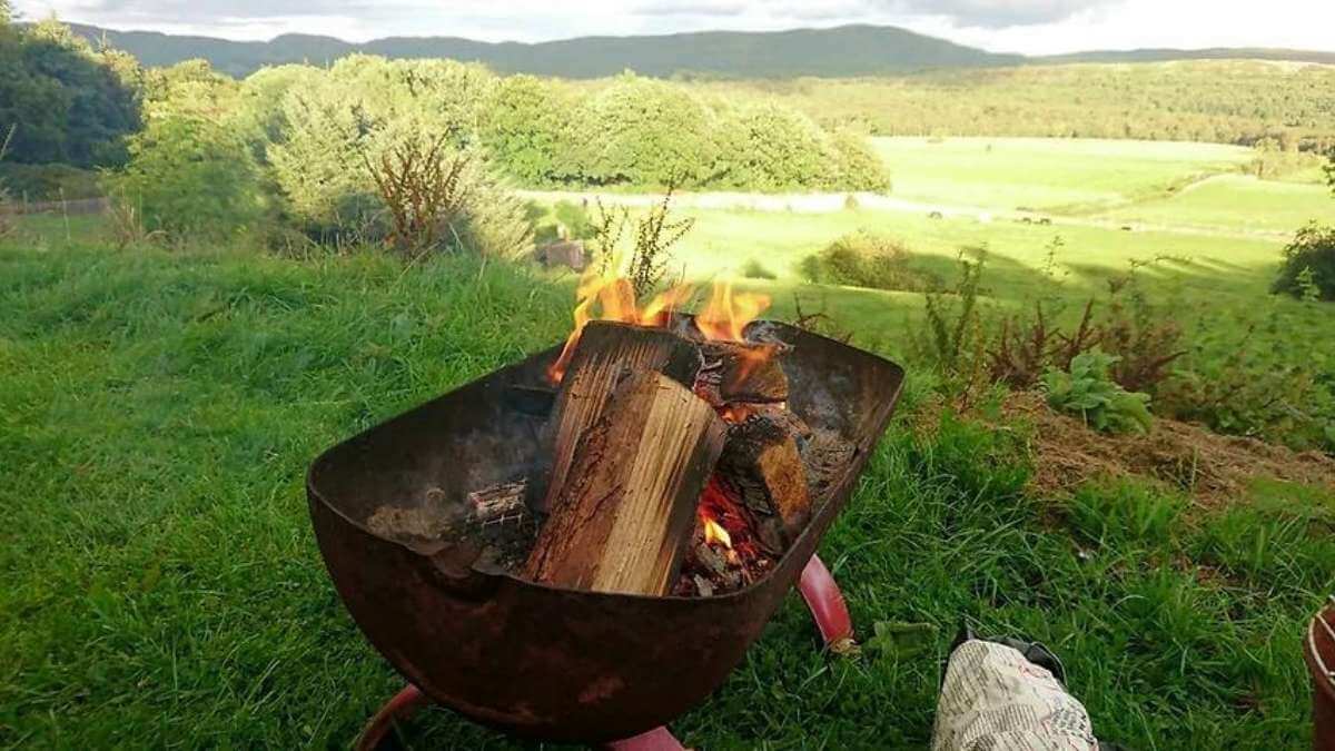 Open fire at Moss Side Farm campsite in the Lake District